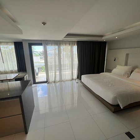 The Nchantra Beachfront Resort Phuket Exterior foto