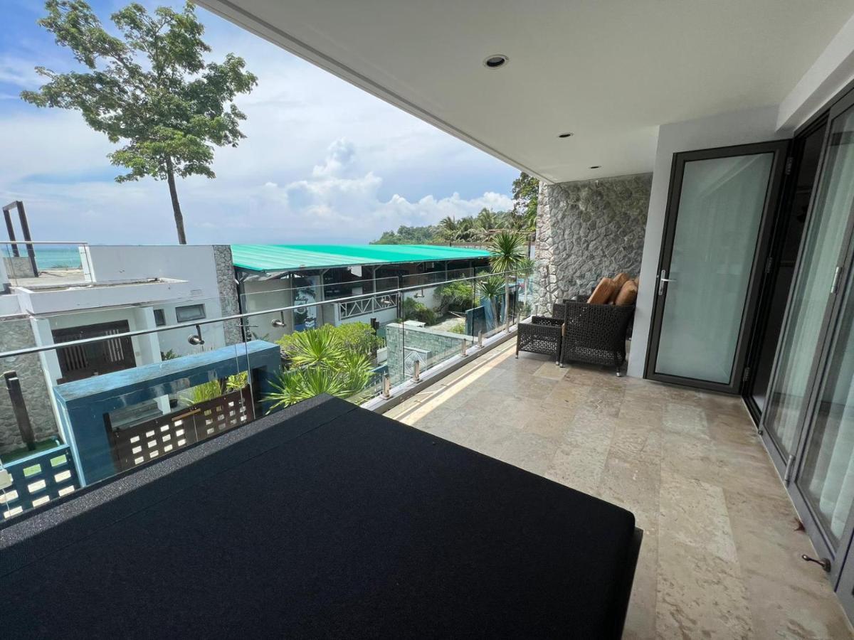 The Nchantra Beachfront Resort Phuket Exterior foto