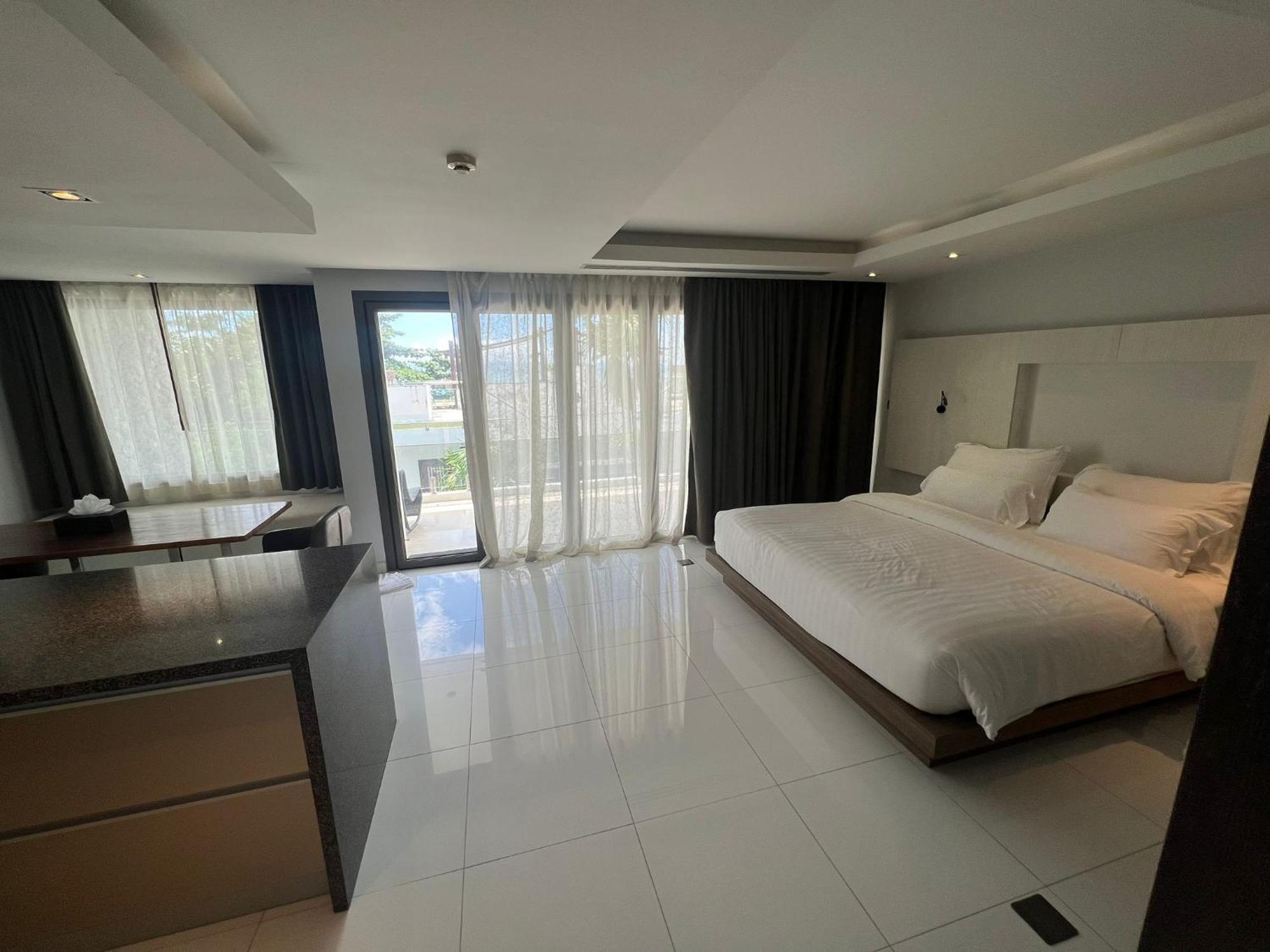 The Nchantra Beachfront Resort Phuket Exterior foto