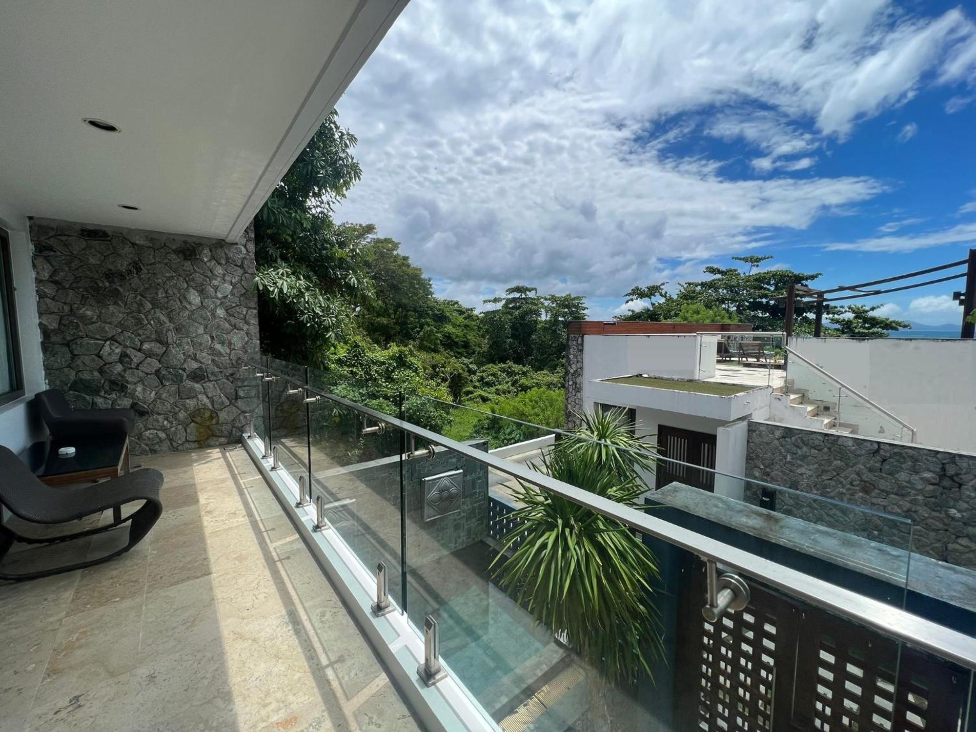The Nchantra Beachfront Resort Phuket Exterior foto