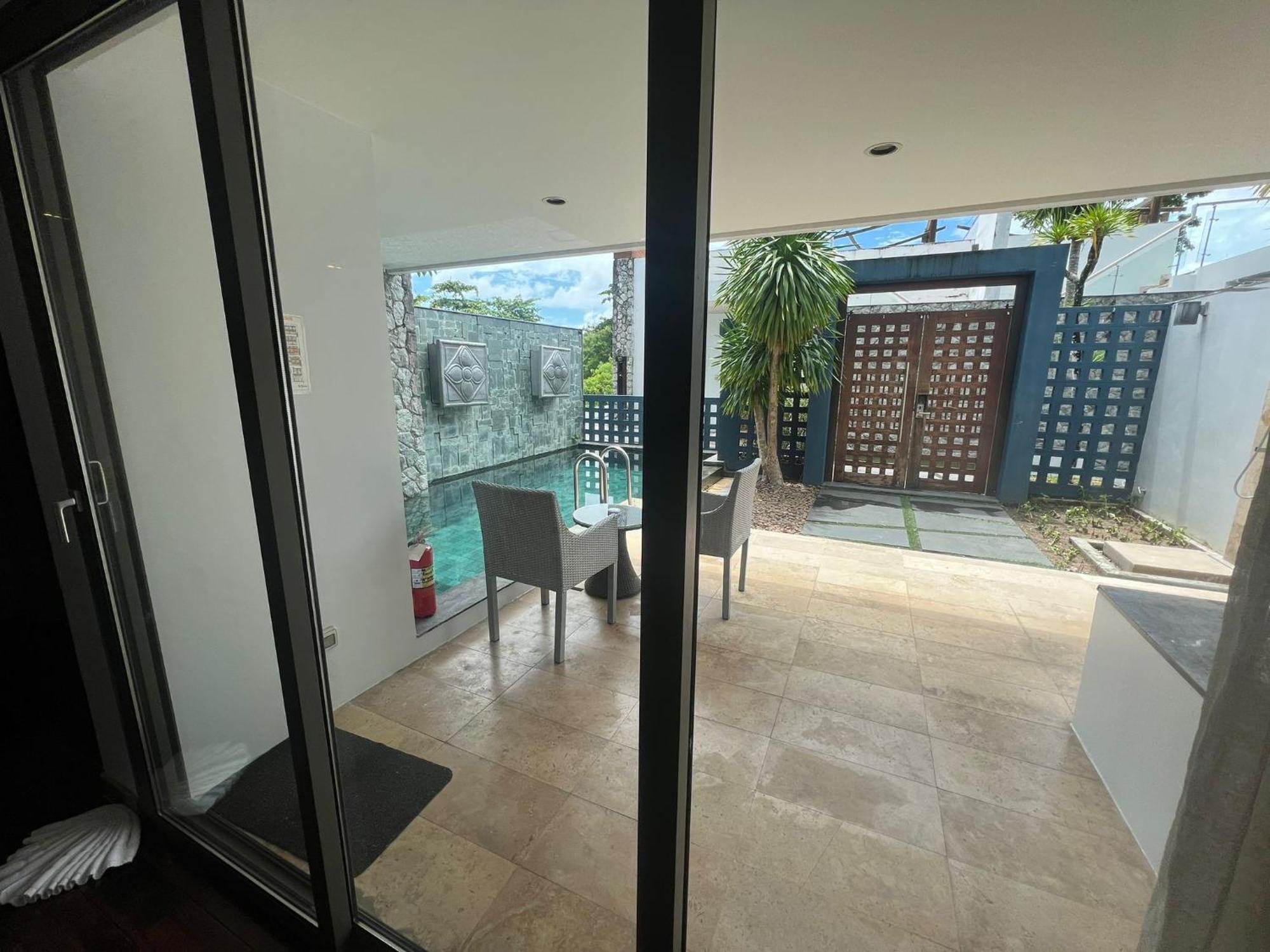 The Nchantra Beachfront Resort Phuket Exterior foto
