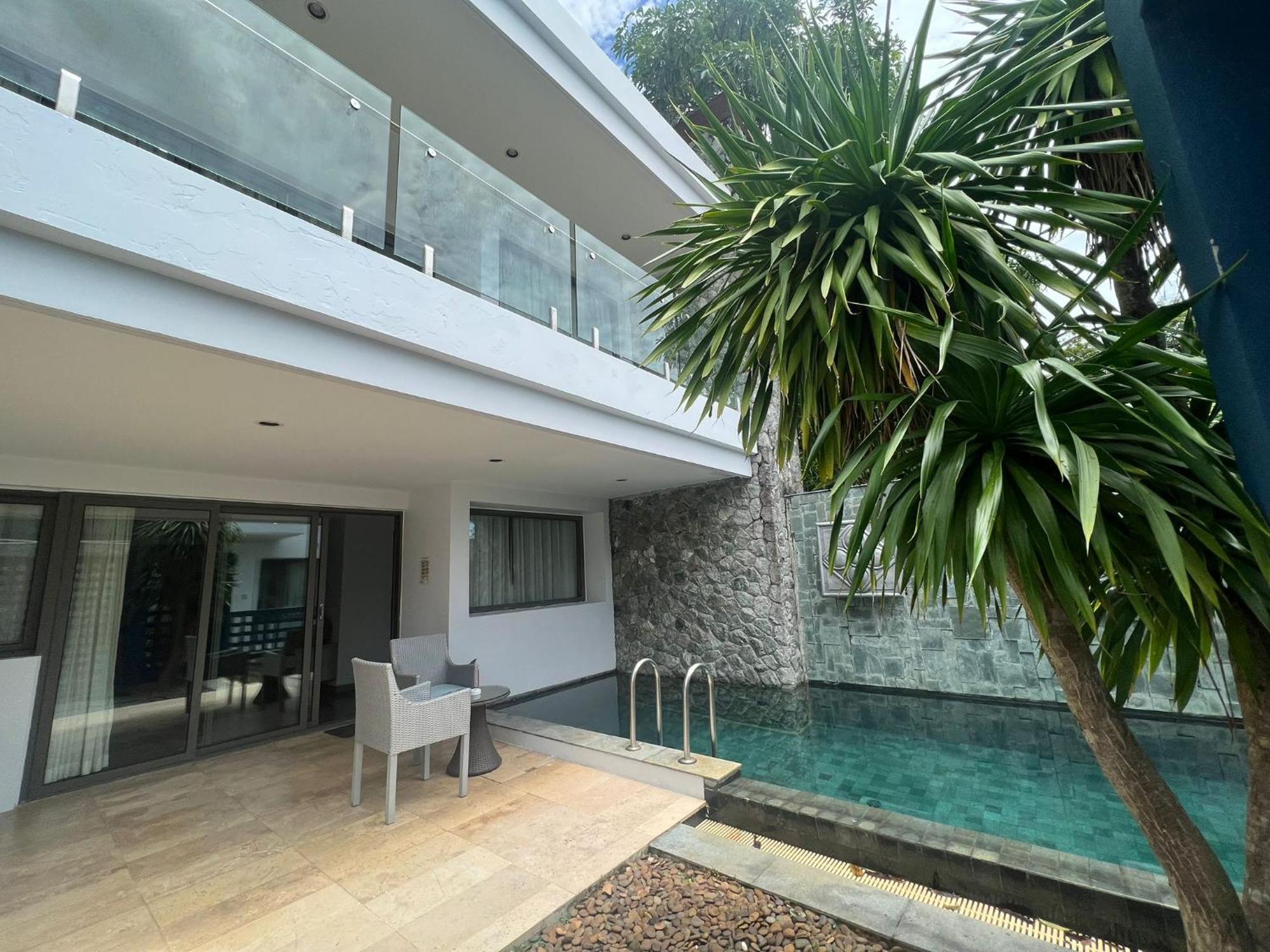 The Nchantra Beachfront Resort Phuket Exterior foto