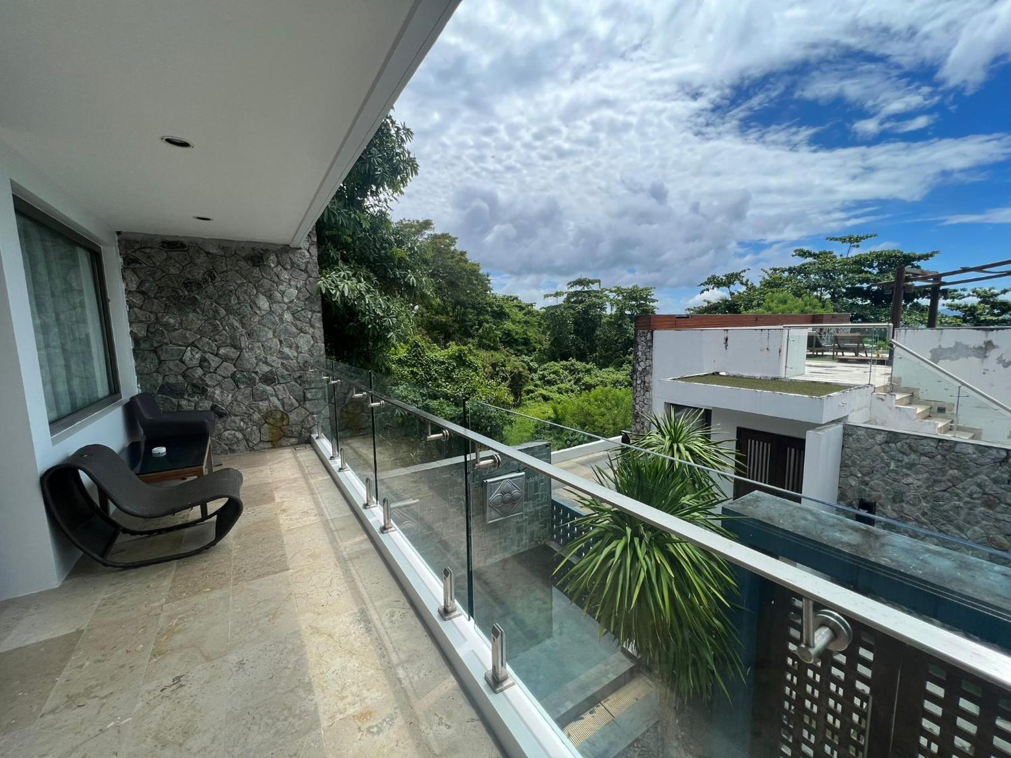 The Nchantra Beachfront Resort Phuket Exterior foto