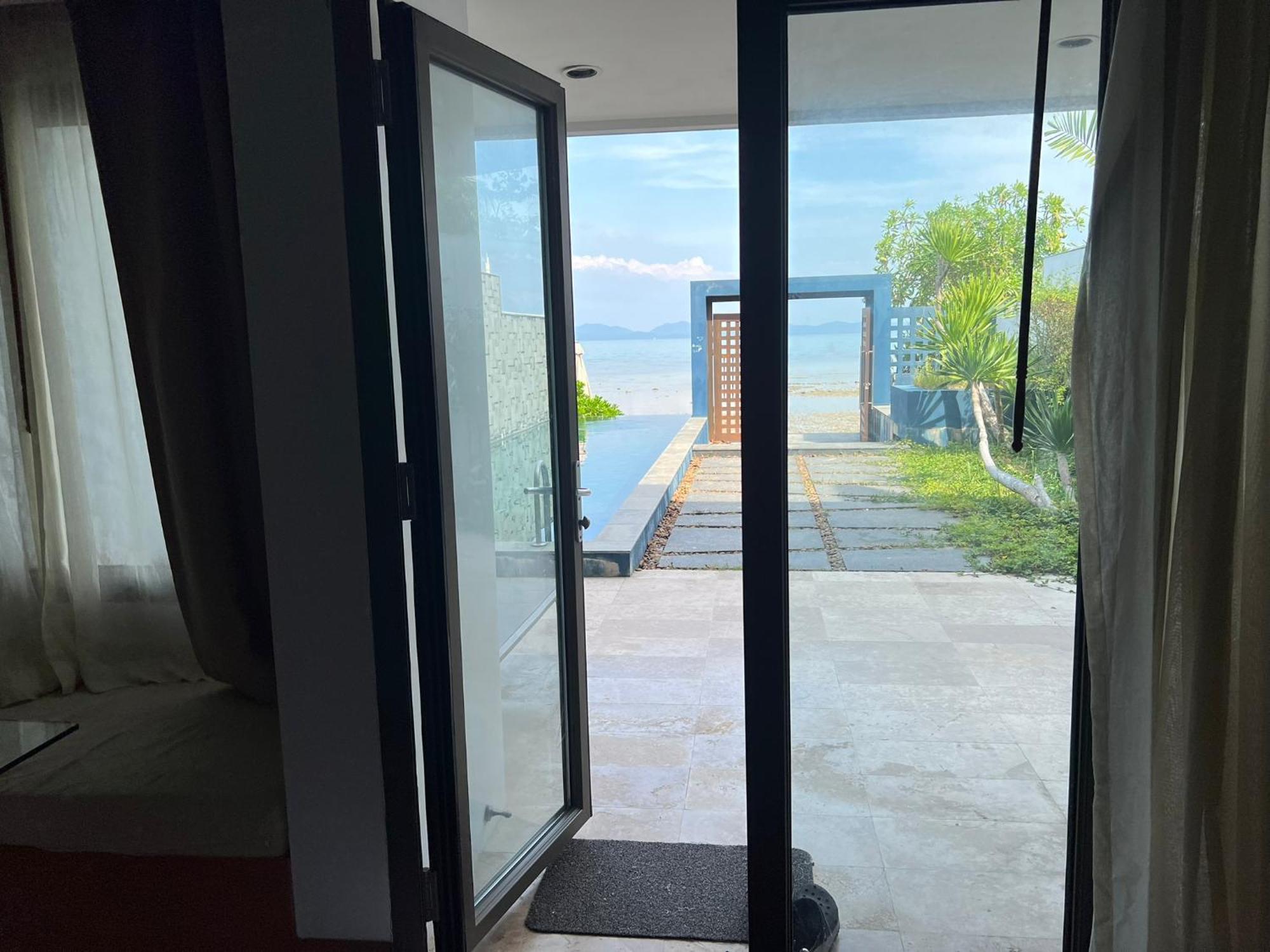 The Nchantra Beachfront Resort Phuket Exterior foto
