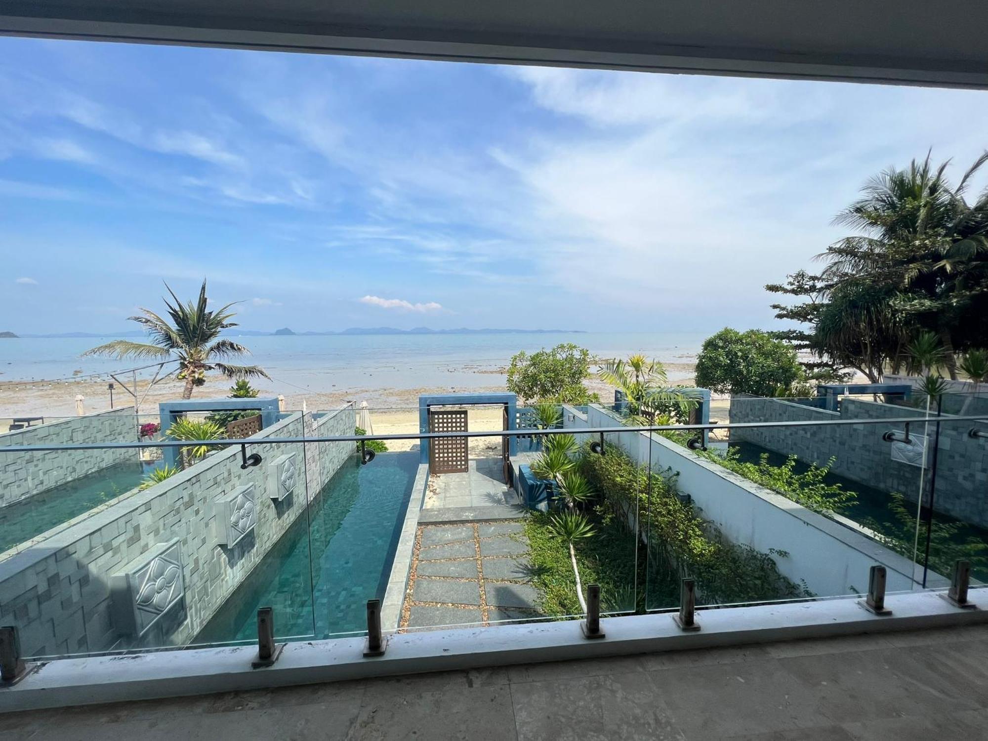 The Nchantra Beachfront Resort Phuket Exterior foto