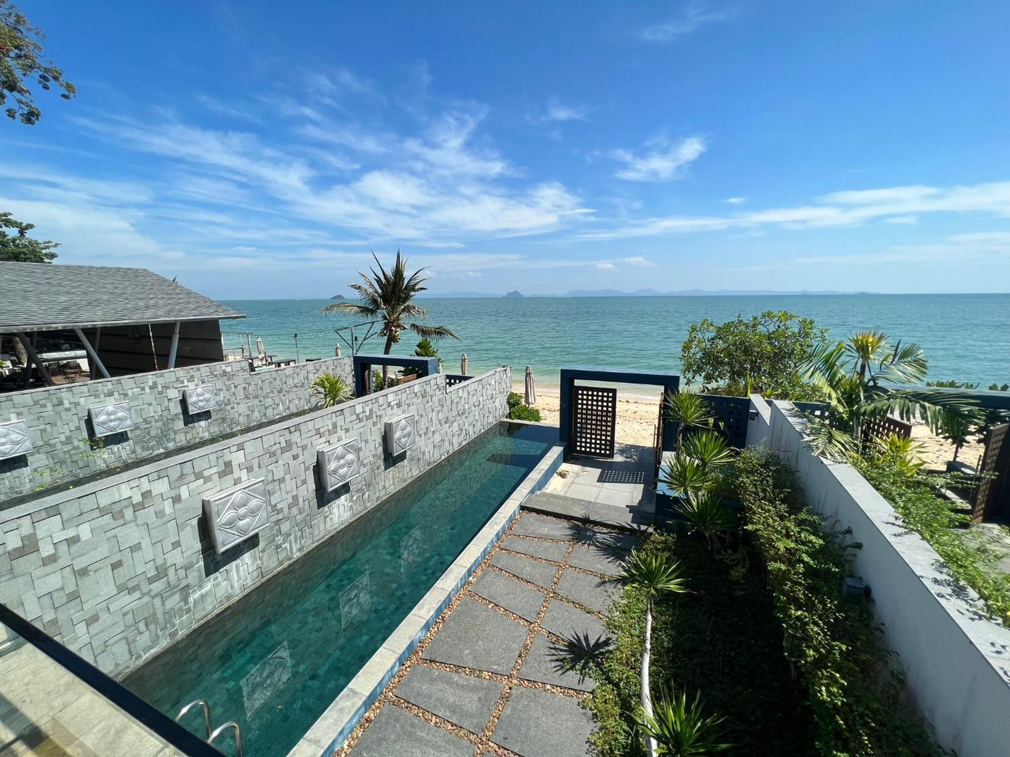 The Nchantra Beachfront Resort Phuket Exterior foto