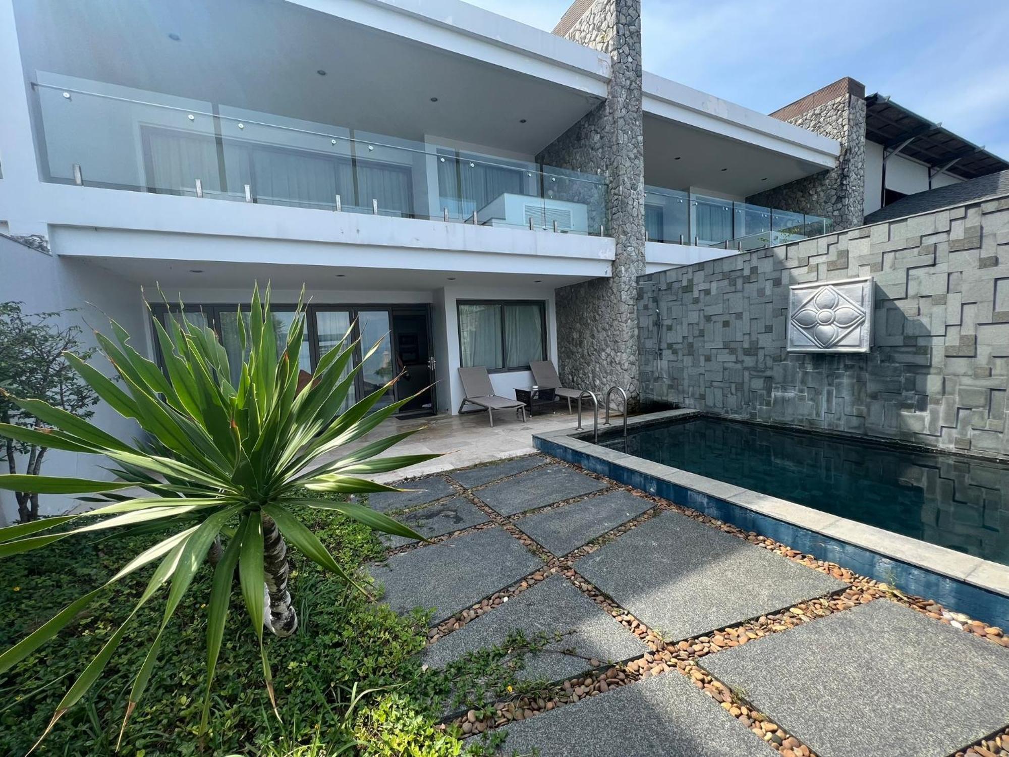 The Nchantra Beachfront Resort Phuket Exterior foto