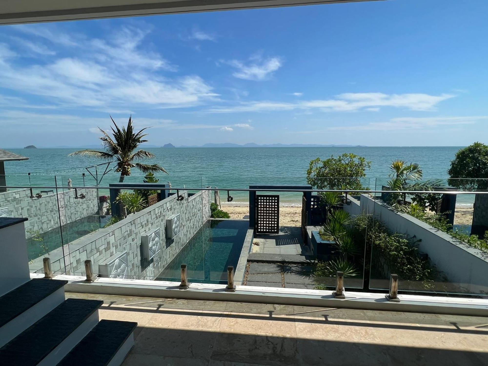 The Nchantra Beachfront Resort Phuket Exterior foto