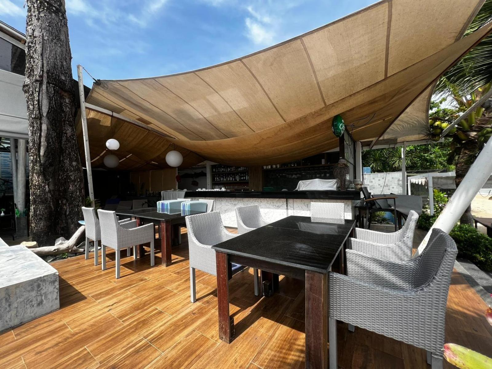 The Nchantra Beachfront Resort Phuket Exterior foto