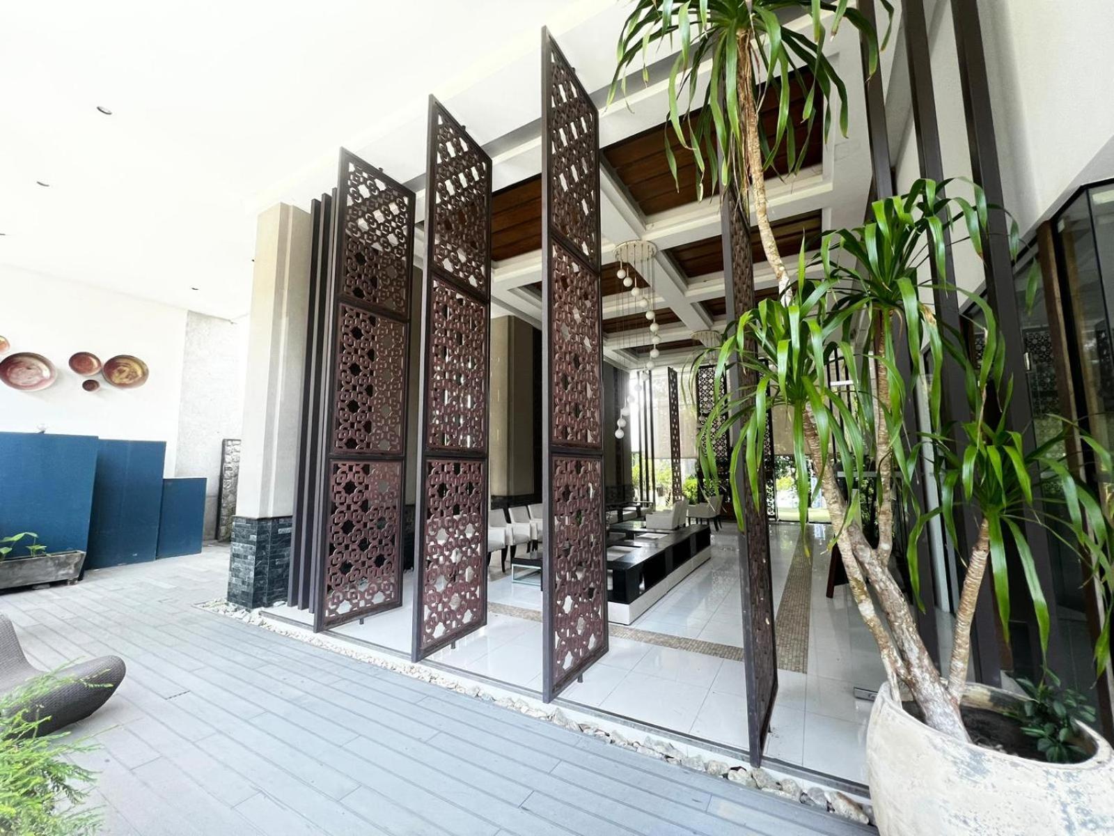 The Nchantra Beachfront Resort Phuket Exterior foto