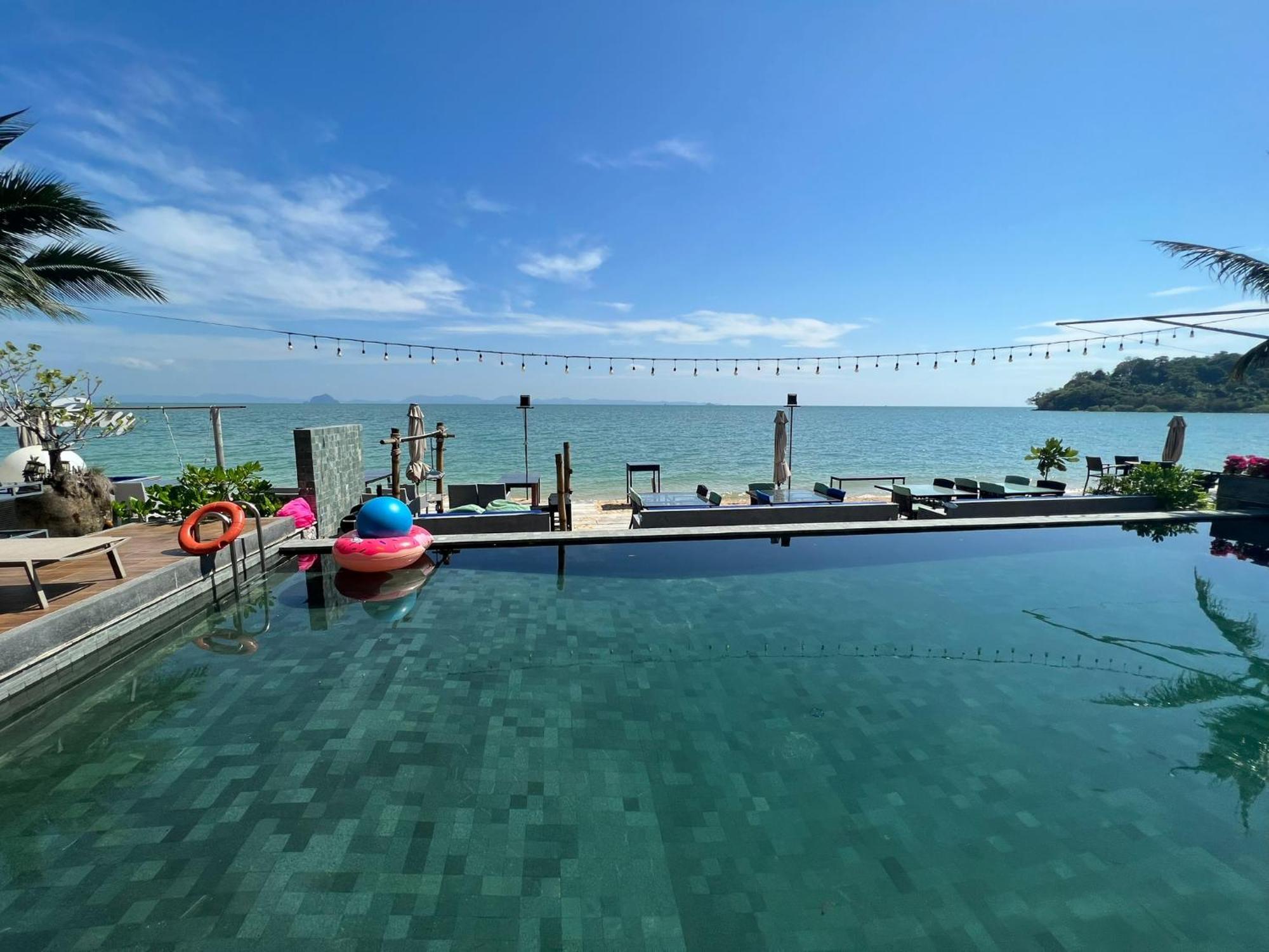 The Nchantra Beachfront Resort Phuket Exterior foto
