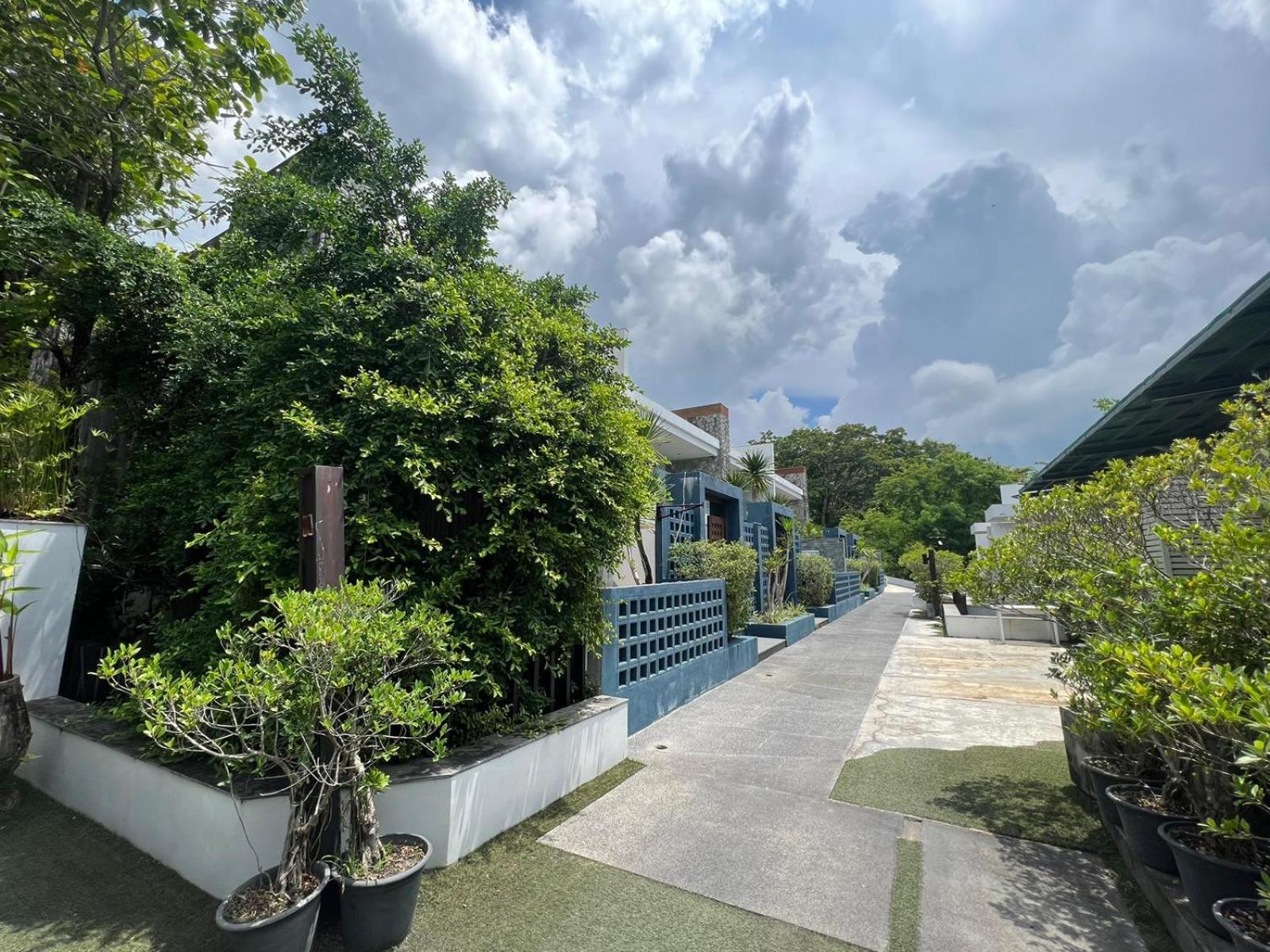 The Nchantra Beachfront Resort Phuket Exterior foto