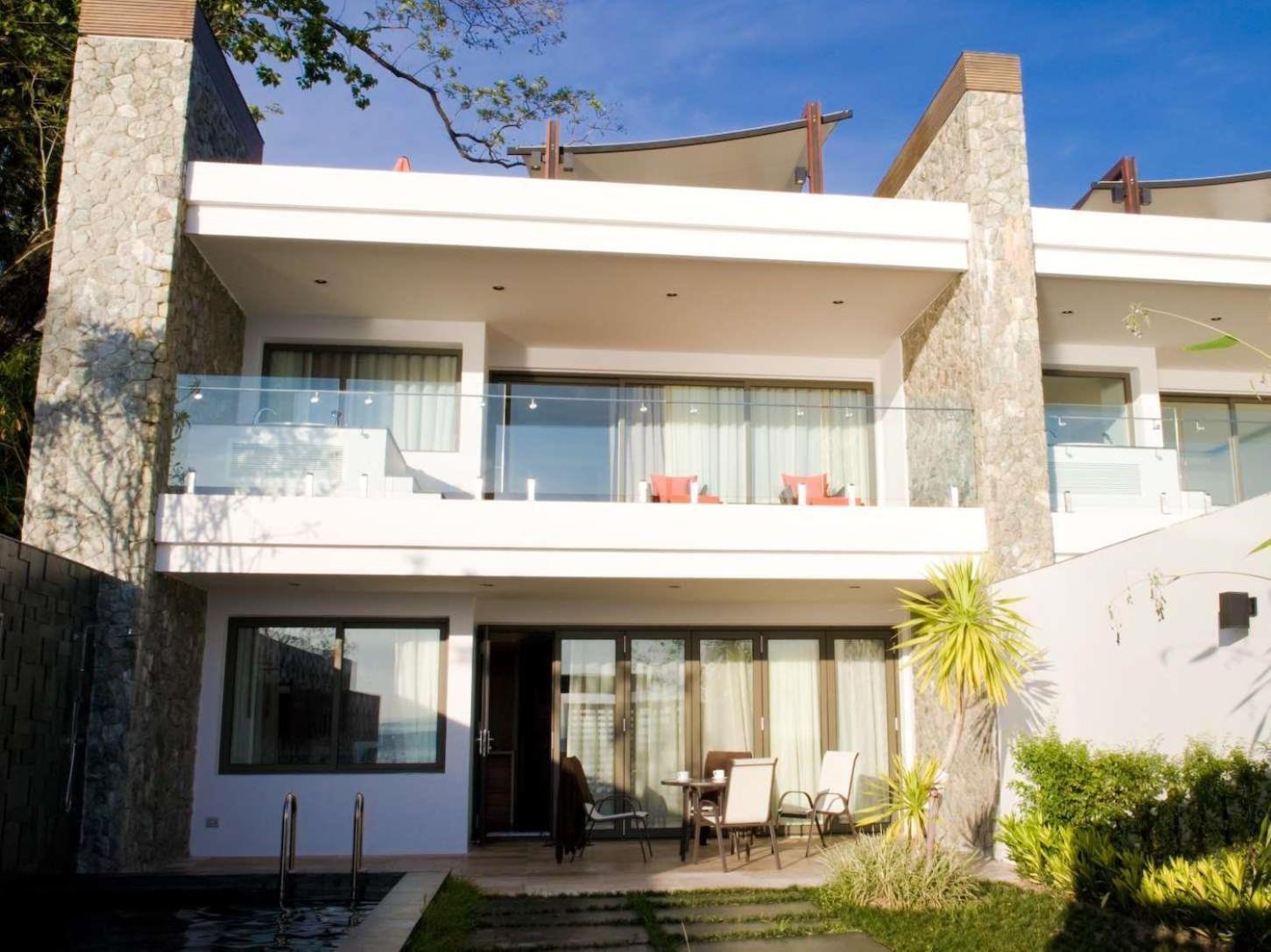 The Nchantra Beachfront Resort Phuket Exterior foto