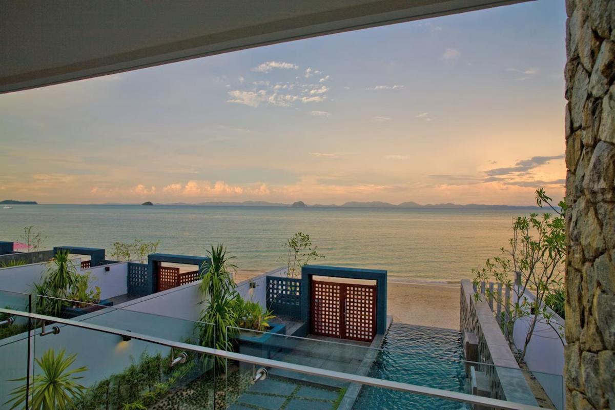 The Nchantra Beachfront Resort Phuket Exterior foto