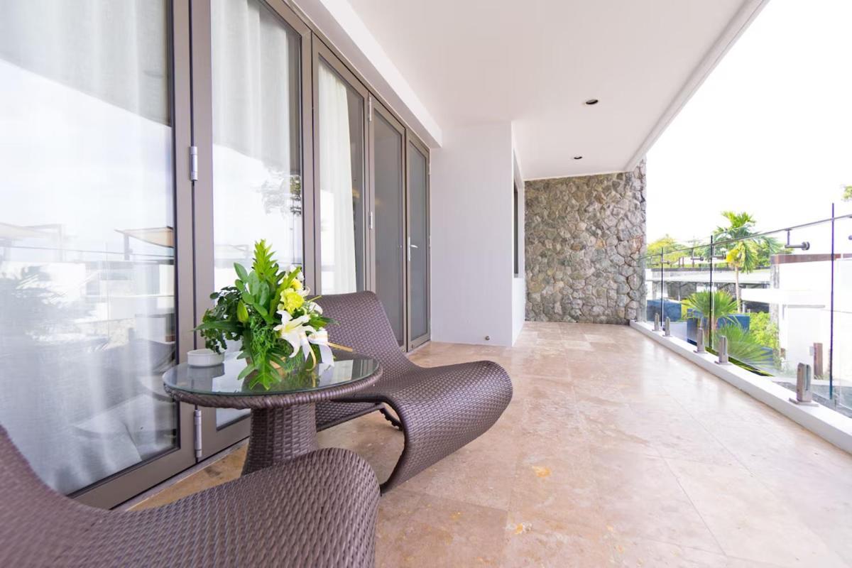 The Nchantra Beachfront Resort Phuket Exterior foto