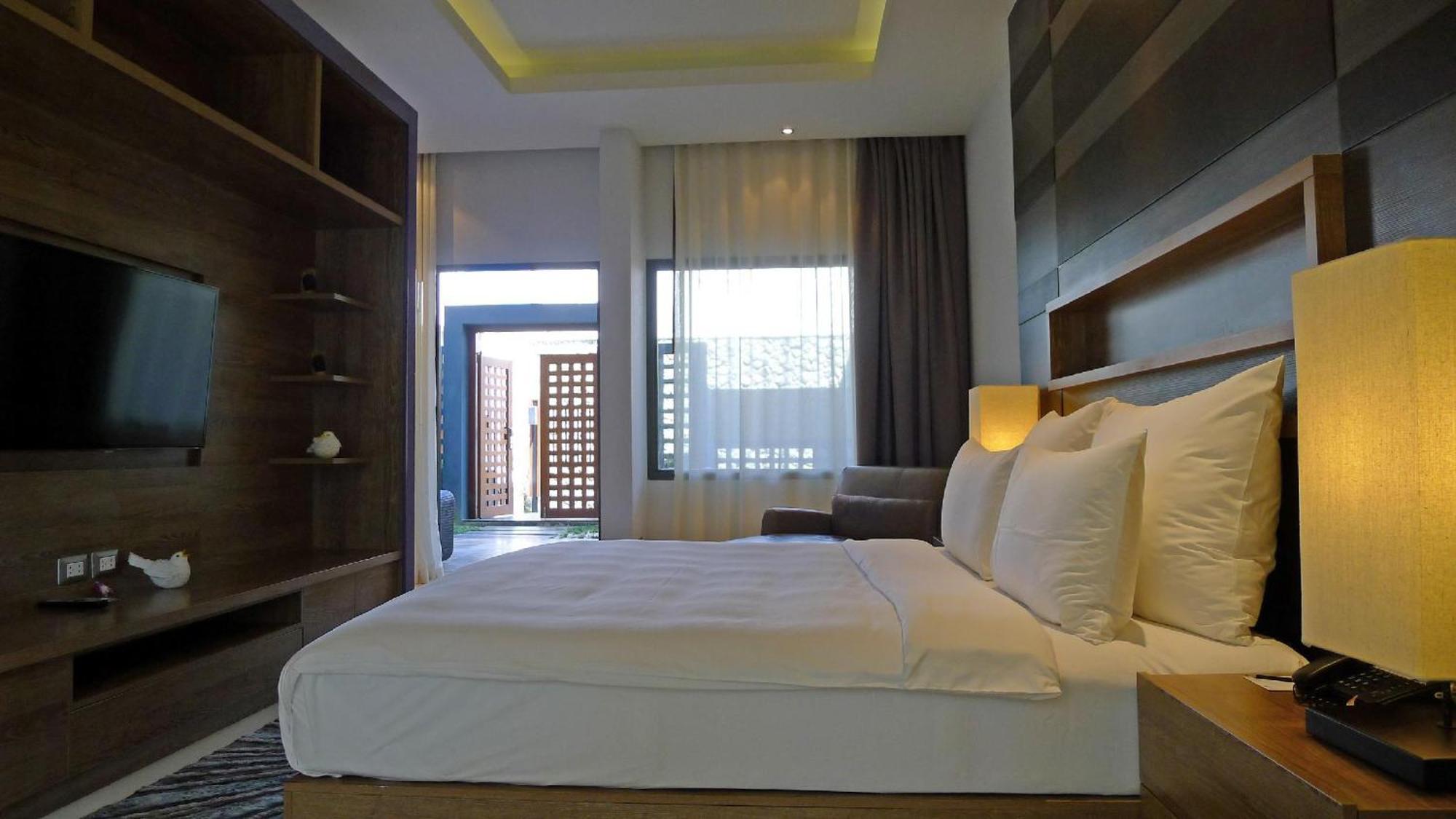 The Nchantra Beachfront Resort Phuket Exterior foto