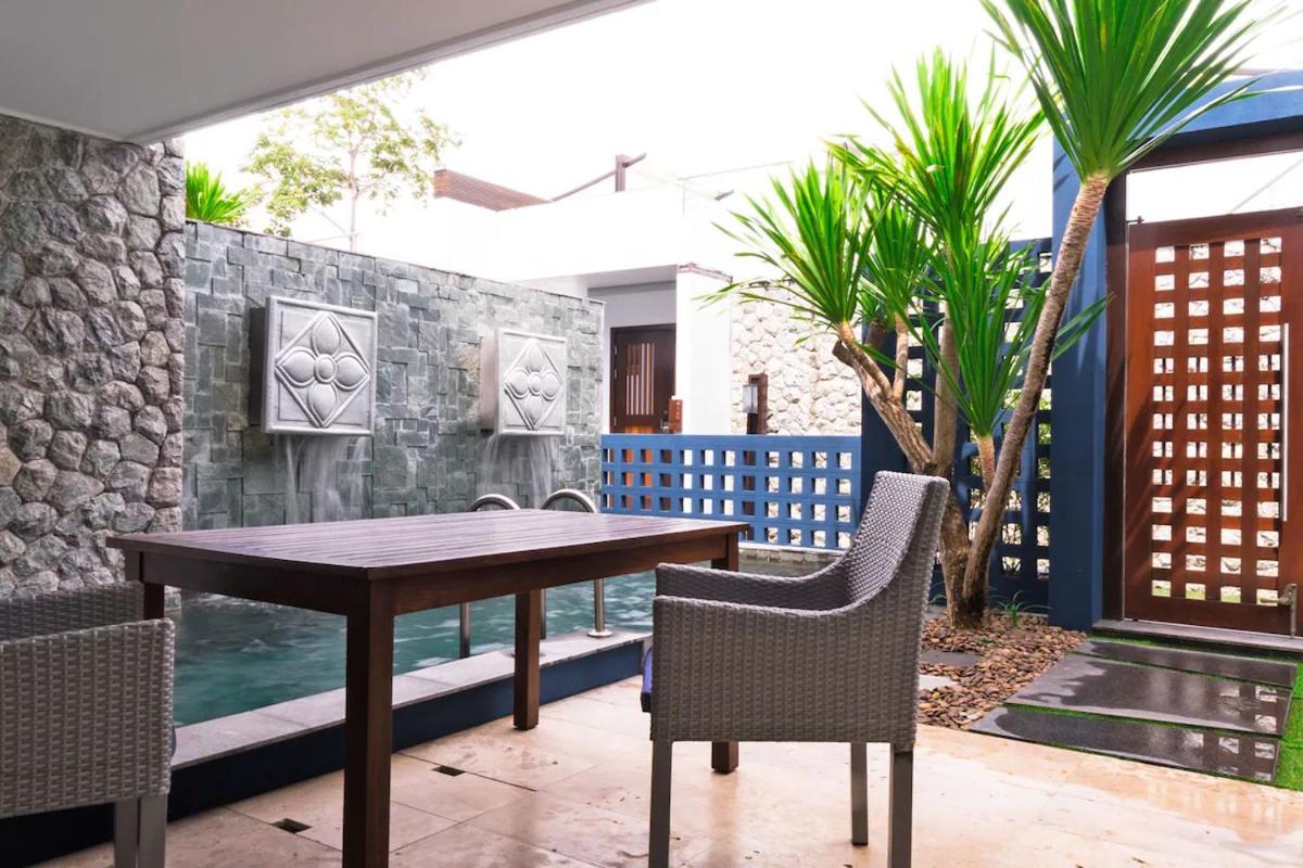 The Nchantra Beachfront Resort Phuket Exterior foto